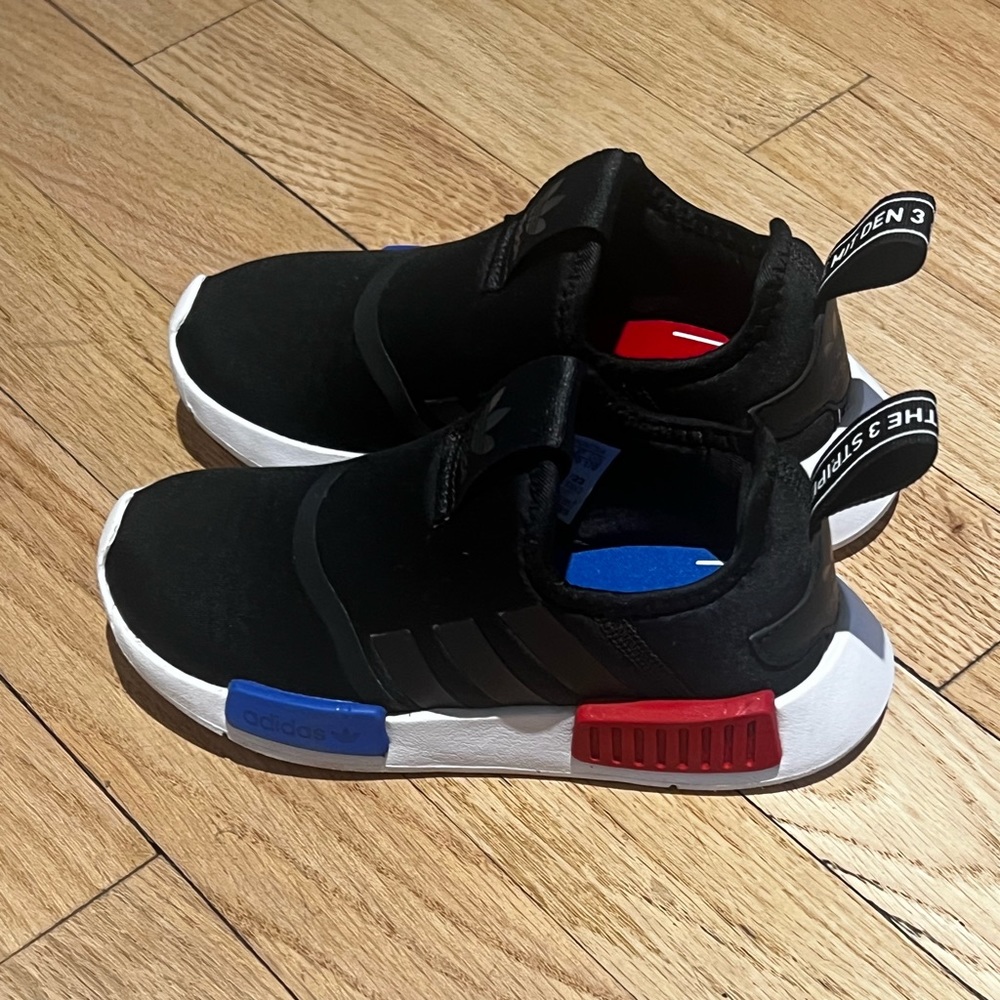 Brand new! Worn once. Took too long from purchase date to put them on my son